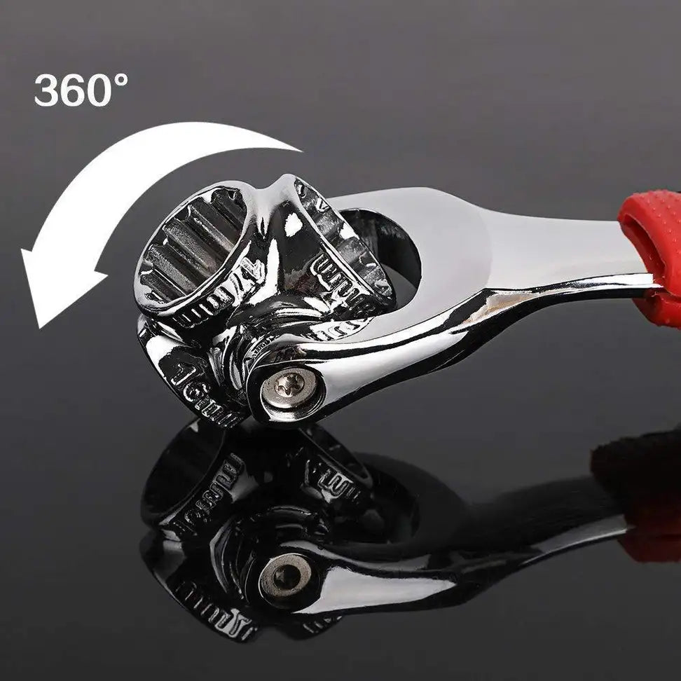 Wrench tool with a red handle on a reflective surface