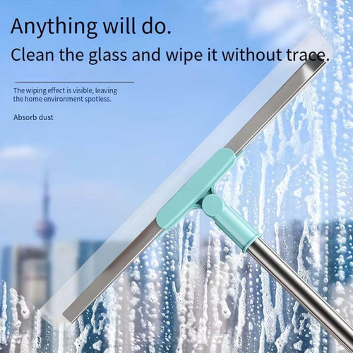 Window cleaning tool with a blue squeegee on a window with a cityscape background.