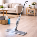 Mop cleaning a wooden floor in a living room setting