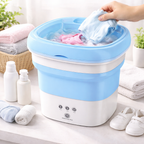Collapsible washing machine with clothes being washed on a table.