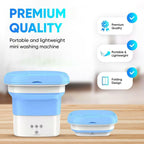 Portable mini washing machine with blue and white design on a wooden surface