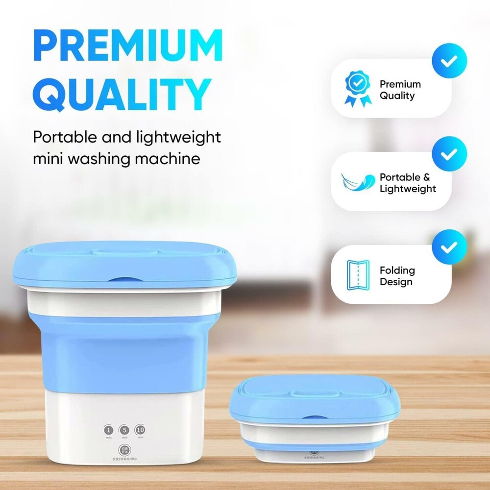 Portable mini washing machine with blue and white design on a wooden surface