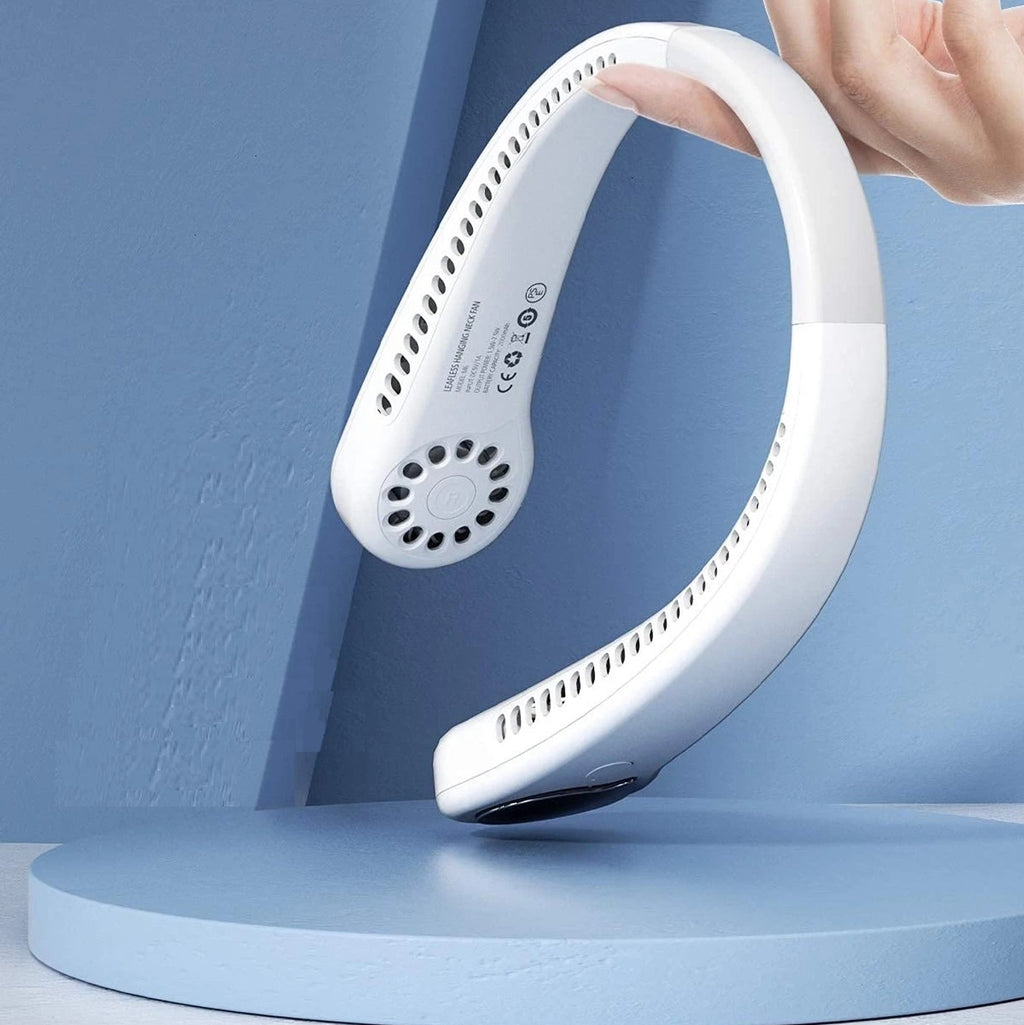 White neckband device held by a hand against a blue background